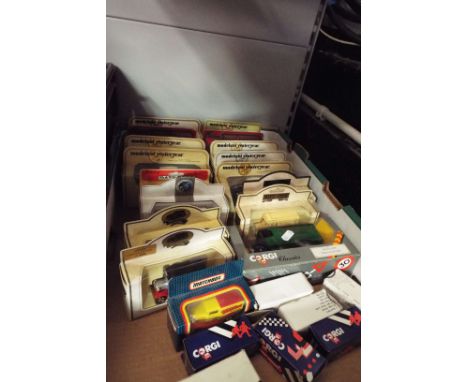 Twenty four Matchbox, Corgi, & Lledo die-cast vehicles mainly advertising commercial vans