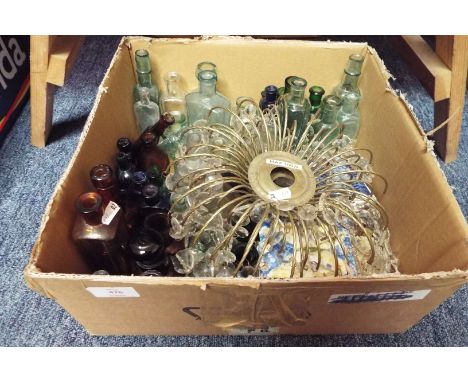 A mixed selection of items to include vintage bottles, lamp shades etc 