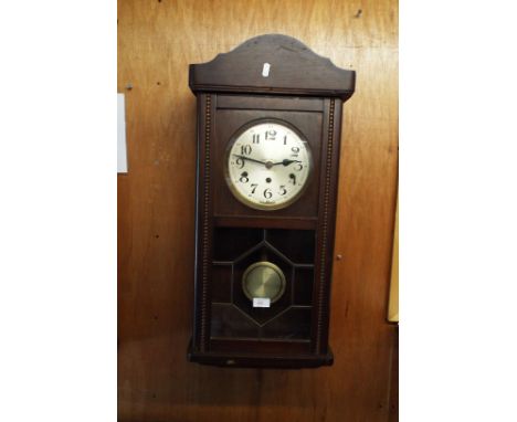 A Johnson & Co chronometer timepiece with eight day movement set in a mahogany and glazed case 