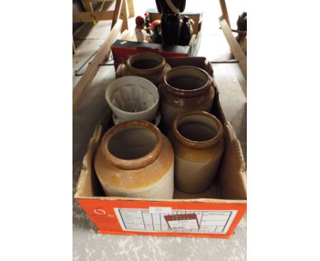 Four stoneware jars and two ceramic jelly moulds
