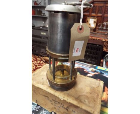 A vintage Davy lamp by BCM Wolf Safety Lamp Company with original box
