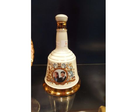 An unopened Bells Scotch Whiskey Wade commemorative decanter celebrating the marriage of  'Andrew & Miss Sarah Ferguson'