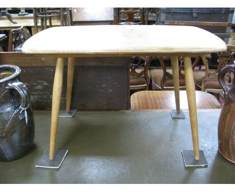 Ercol Light Elm Coffee Table, circa mid XX Century with rounded corners to rectangular top, on splayed tapering legs, 72.5cm 