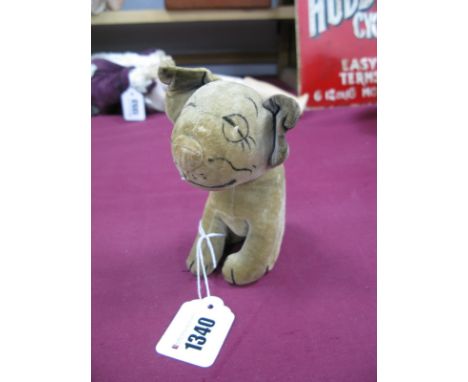 A Pre-War Soft Toy 'Bonzo' The Dog, by Chad Valley, 14cm high, tin button intact.