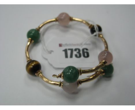 A Modern Hardstone Bead Bangle, with alternate textured design.