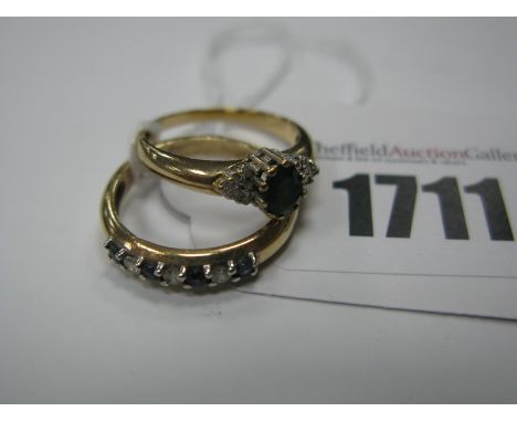 A Modern 9ct Gold Dress Ring, oval claw set centre, within claw set, inset shoulders, a 9ct gold alternate claw set band ring