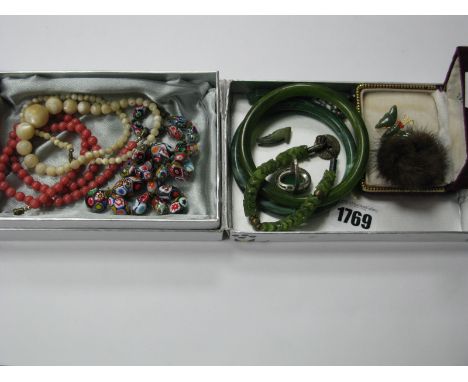 A Jadite Butterfly Brooch; together with further hardstone and Jadite/Jade coloured costume jewellery, including bangles, bra