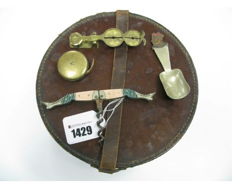 A Decorative Novelty Corkscrews, as a pair of ladies legs; a pair of brass Sovereign scales, 1935 Silver Jubilee caddy spoon,