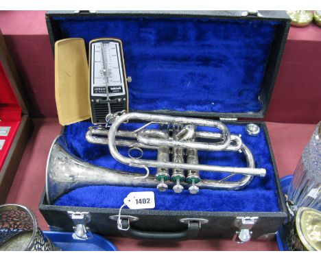 Faithful Industries Plated Trumpet and Taktell Junior Metronome.