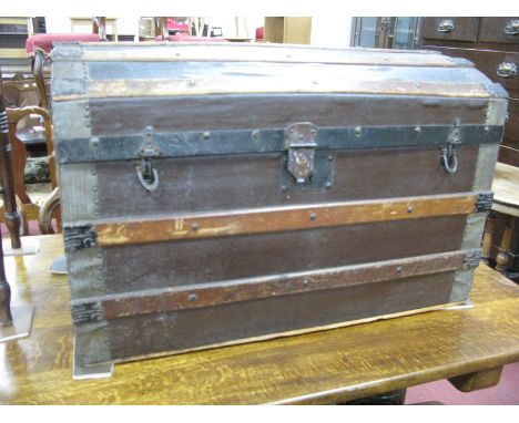 A Wood and Metal Bound Dome Topped Travelling Trunk, with carry handles and inner tray, 77cm wide.