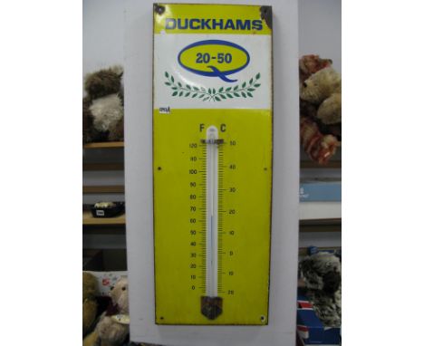 Advertising Enamel Wall Sign for 'Duckhams 20-50' Oil, with central thermometer on yellow ground, 91.5cm high.