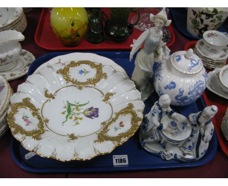 A Wade Figure of a Dutch Girl with Basket of Tulips, Royal Crown Derby 'Derby Posies' plate, modern Meissen bowl, Royal Worce