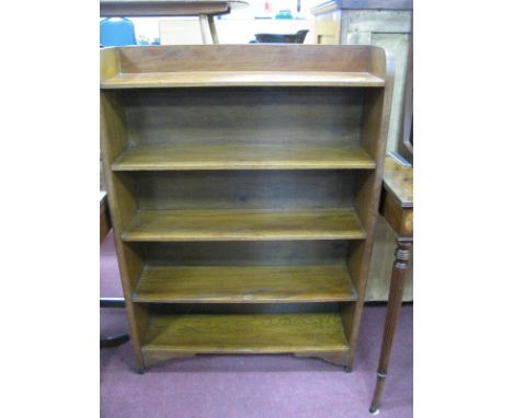 A 1920'S Oak Bookcase, with a three-quarter gallery, four fixed shelves, on bracket feet, 76 x 108cm.