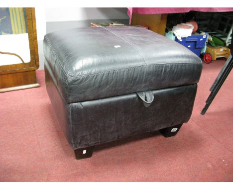 A Black Leather Storage Pouffe.