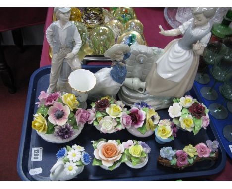 Three Nao Figures; Girl at a Well, Young Boy and Young Girl, plus a collection of floral posies and a Wedgwood bud vase:- One