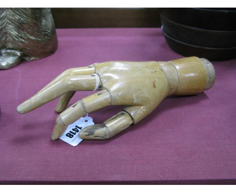 A 1920's Articulated Wooden Mannequin Hand, 27cms.