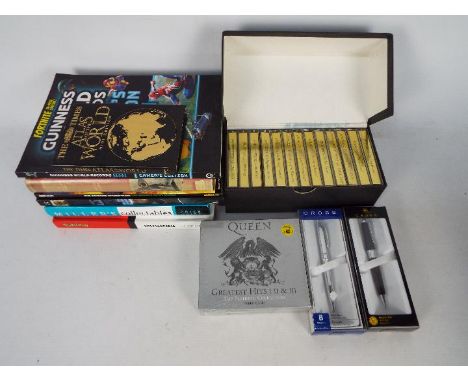 Lot to include publications on antiques, Pokemon, model soldiers and other, Queen compact disc box set, Lord Of The Rings aud