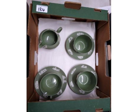A Wedgwood sage green set of three cups &amp; saucers: together with similar milk jug 