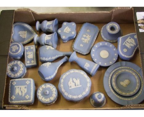 A collection of Wedgwood jasperware: to include plates, bud vases, lidded boxes, candlestick, bell etc (1 tray) 