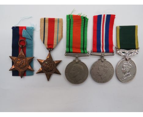 Territorial Efficiency Medal  GVI example named to “2583435 Dvr. G E Sewter R. Sigs”.  Together with 1939/45 Star, Africa Sta