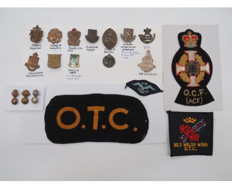 Selection of Various Badges  including Vic crown bugle with central “GSC” ... White metal Royal Irish Reg collar ... Small se