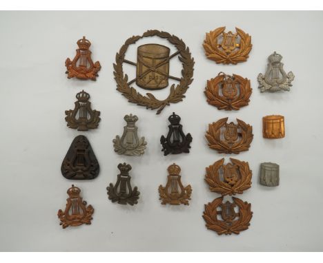 Selection of Musicians’ Badges consisting brass drum within a laurel wreath ... 5 x brass harp within large wreath ... 2 x Vi