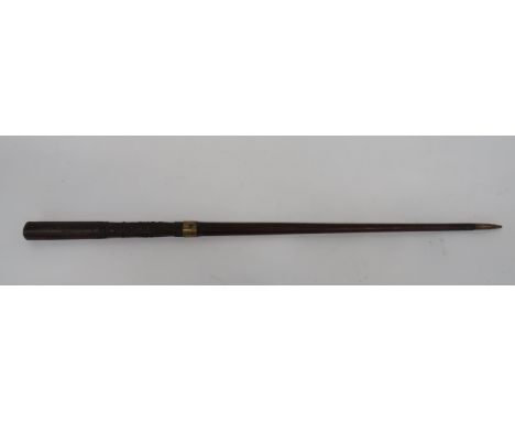 Carved Regimental 4th Bedfordshire Reg Walking Stick  polished wooden stick with lower cartridge and bullet base.  Carved top