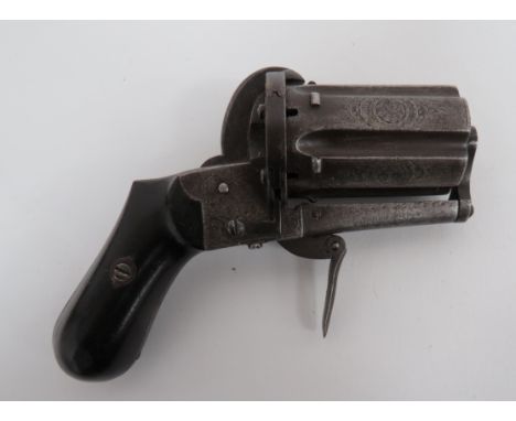 Continental Pinfire Pepperbox Revolver  8 mm PF, 2 inch, six shot barrel cylinder.  The fluted cylinder with shell and scroll