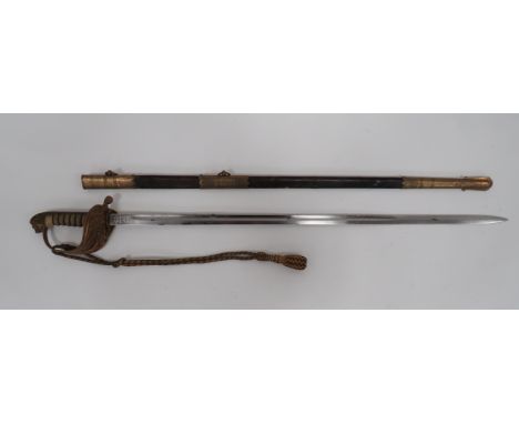 Post 1952 Royal Navy Officer’s Sword by Wilkinson  31 1/2 inch, single edged, narrow blade with large fuller.  The forte with