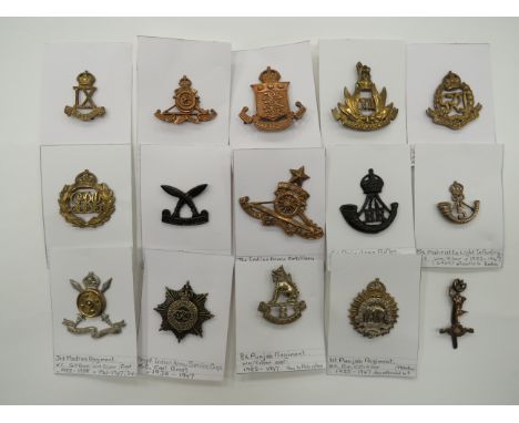 Selection of Indian Badges  consisting KC cast bi-metal 1st Punjab Reg ... KC cast bi-metal 3rd Madras Reg ... Cast white met