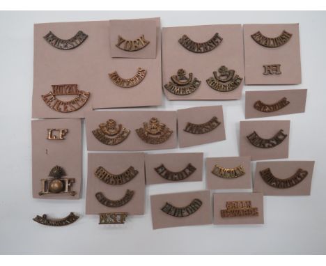 Selection of Infantry Shoulder Titles  brass examples include Leicester ... Royal Leicester ... Cheshire ... RSF ... Lincoln 
