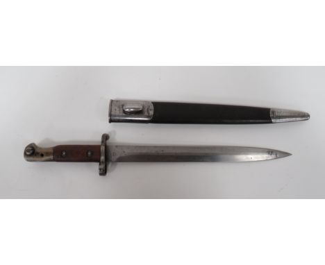 1903 Pattern SMLE Bayonet  12 inch, double edged blade.  The forte with crowned 1903.  Dated “11/02” with maker “Wilkinson Lo