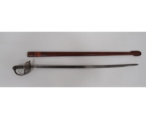 Victorian Light Infantry Officer’s Sword  32 1/2 inch, narrow blade with wide fuller.  Etched Victorian crown and floral spra