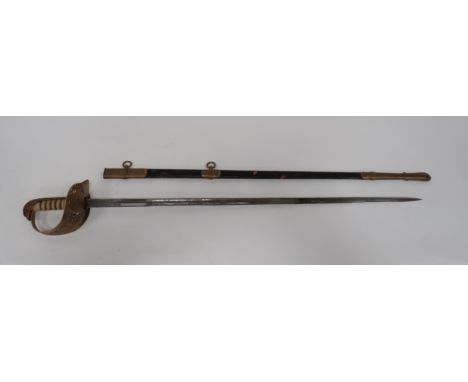 Post 1952 Royal Air Force Officer’s Sword By Wilkinson  32 3/4 inch, single edged, narrow blade with wide fuller.  Etched fol