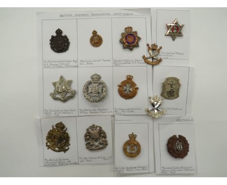 Selection of Various British Overseas Colonial Cap Badges  including KC brass British Guiana Volunteer Force ... White metal 