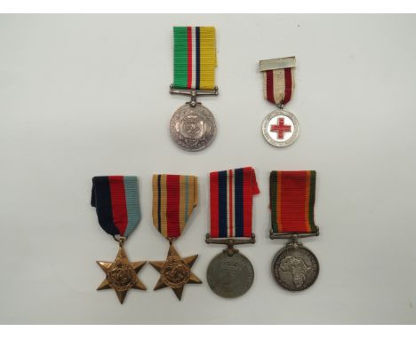 South African Family Medal Group  consisting Anglo-Boer War medal 1899-1902 named “Burg. P J Du Preez”.  Together with 1939/4