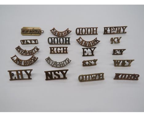 Selection of Yeomanry Shoulder Titles  brass titles include NSY ... NSY/44 RTR ... Lanark ... KY ... RGH ... R 1st DY ... QOW