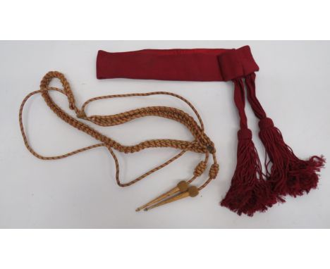 Officer’s Crimson Waist Sash and Staff Officer’s Aiguillette   crimson silk, wide waist belt with side hidden hook buckle.  T
