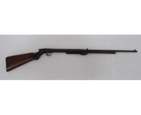 Pre War BSA Air Rifle  .22, 19 1/2 inch barrel.  Top mounted V sight.  Rear, top loading gate.  Under barrel, cocking lever w