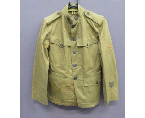 WW1 American 64th Artillery OR’s Tunic  khaki cotton, single breasted, high collar tunic.  Chest and lower patch pockets, all