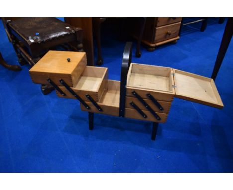 A vintage cantilever sewing box