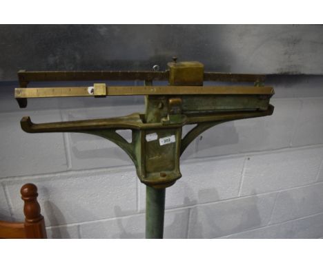 A vintage cast iron balance scale, possibly doctors or similar