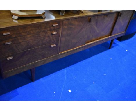 A vintage long john style sideboard with drawers to one side, sliding doors to cabinet and drop flap cocktail section, width 