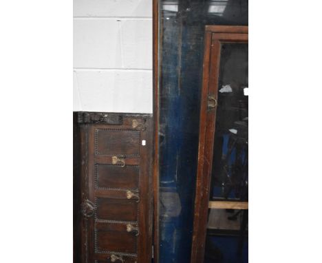 Two vintage showcases and an early 20th wall mounted oak coat rack