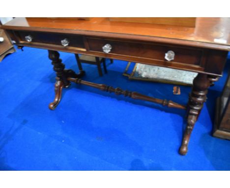 A Victorian mahogany sofa/side table having ledge back, two frieze drawers and glass handles on turned frame, width approx. 1