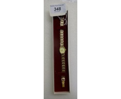 A 9 carat gold cased lady's Accurist diamond wristwatch, to a 9 carat gold gate link bracelet. Condition Report: 14.8 grams