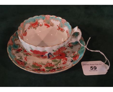 An early 19th century Derby porcelain cup and saucer in the Jabberwocky pattern, believed to be copied from a Worcester patte