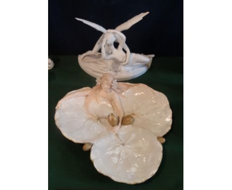 A Vienna Ernst Wahliss Art Nouveau ceramic dish, formed as a maiden on open water lilies (33cm), together with a porcelain fi