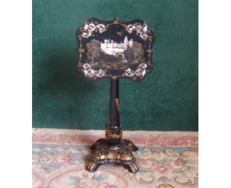 A 19th century papier mache and inlaid mother of pearl telescopic music stand. Condition Report: Good overall condition.
The 