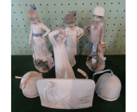 Two Lladro Collector's Society bells (1993 &amp; 1994), together with a Lladro Society plaque and four Nao figurines.